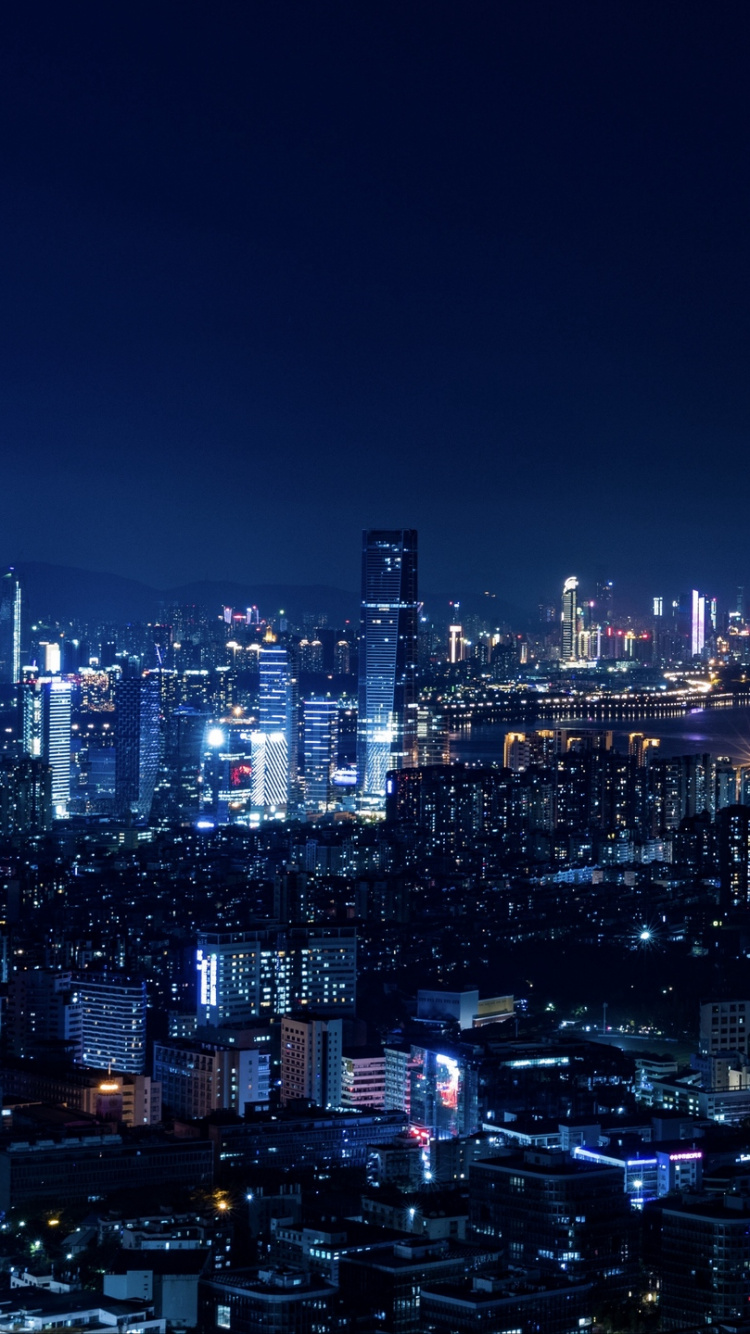 City Skyline During Night Time. Wallpaper in 750x1334 Resolution