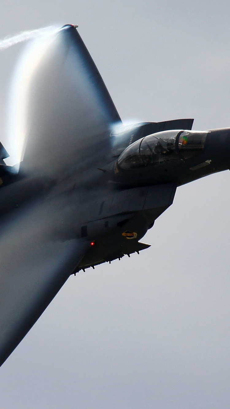 Black Jet Plane in Mid Air During Daytime. Wallpaper in 750x1334 Resolution