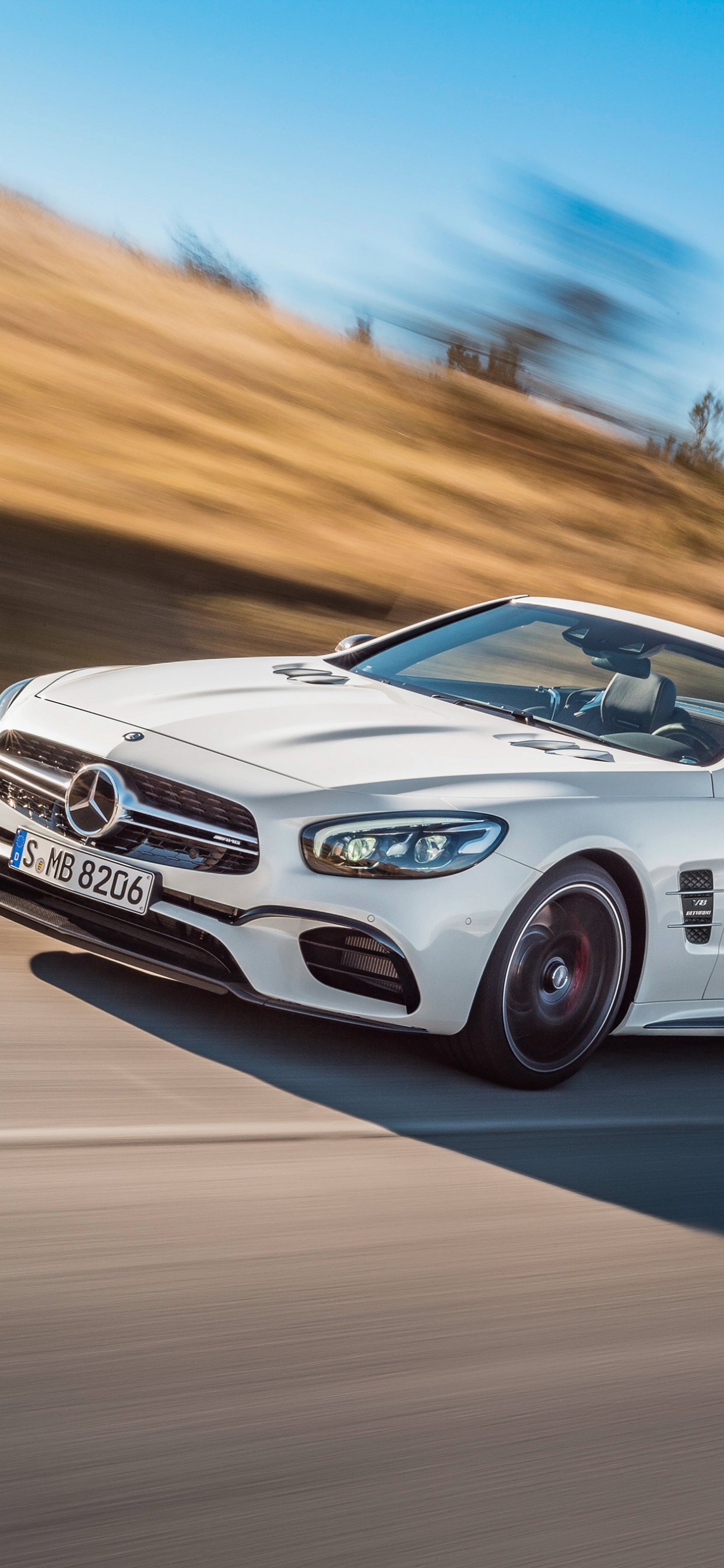 White Bmw m 3 on Road During Daytime. Wallpaper in 1242x2688 Resolution