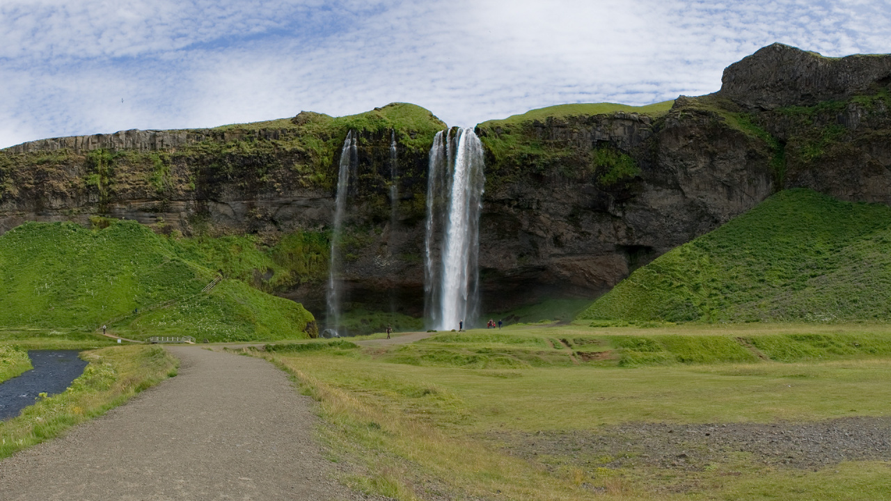 Waterfalls on Green Grass Field Under White Clouds During Daytime. Wallpaper in 1280x720 Resolution
