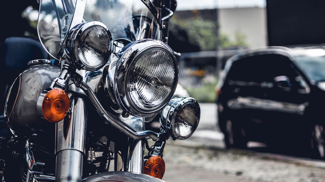 Orange and Black Cruiser Motorcycle. Wallpaper in 1280x720 Resolution