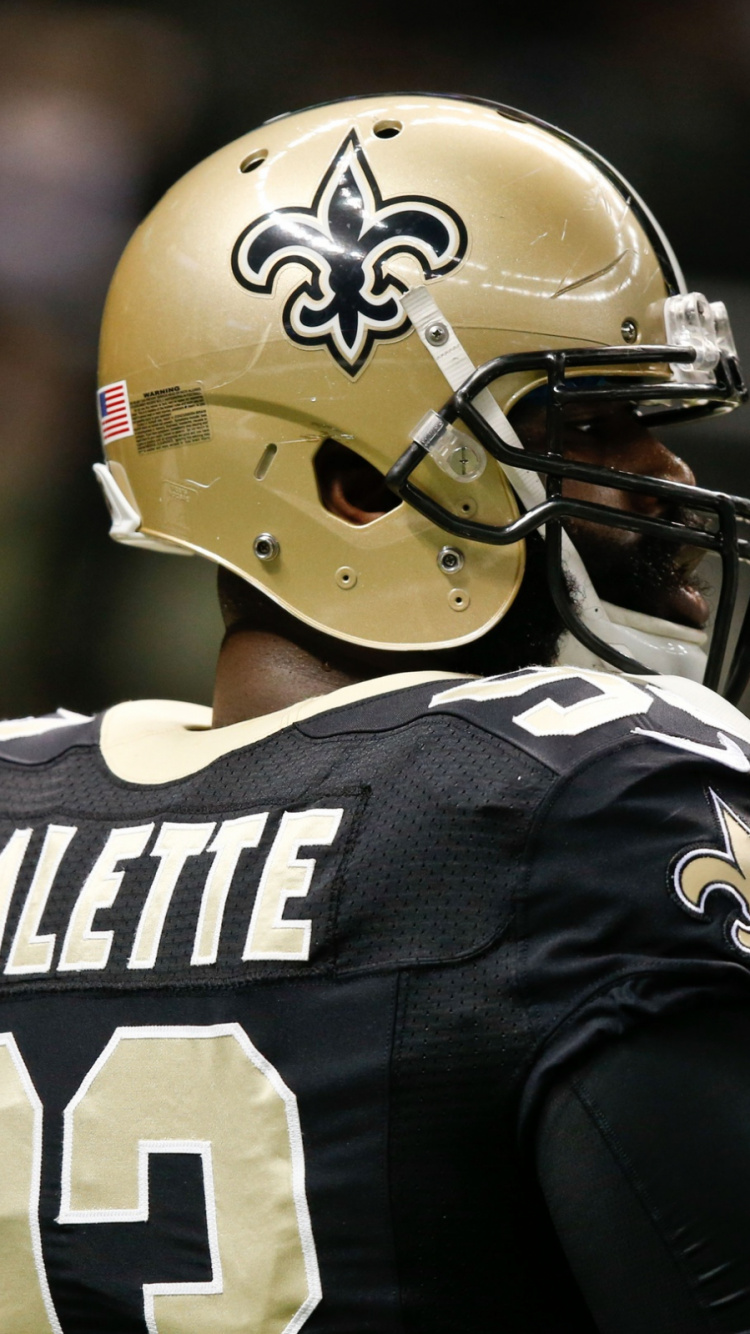 Fußballspieler im Schwarz-weißen Trikot-Shirt. Wallpaper in 750x1334 Resolution