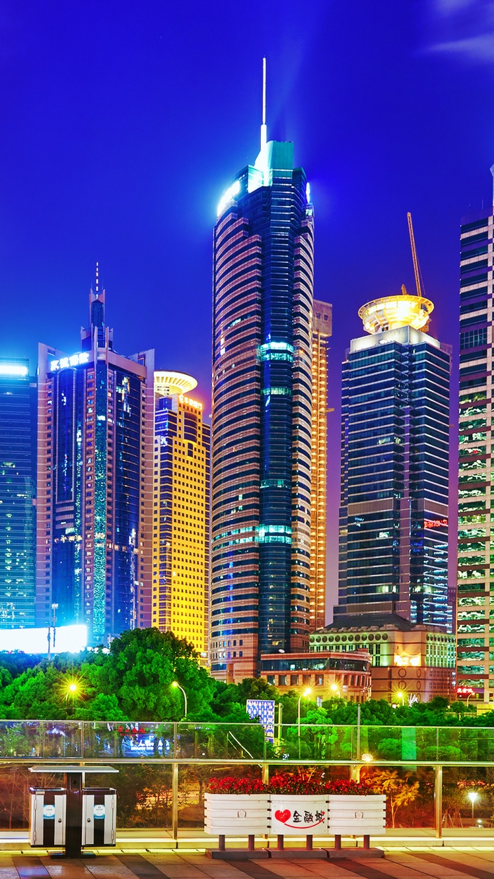 City Skyline During Night Time. Wallpaper in 720x1280 Resolution