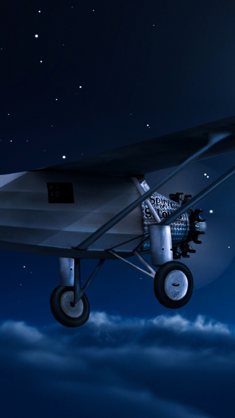 White and Blue Airplane Under Blue Sky During Night Time. Wallpaper in 750x1334 Resolution