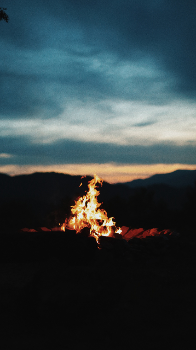 Fire on Ground During Night Time. Wallpaper in 750x1334 Resolution