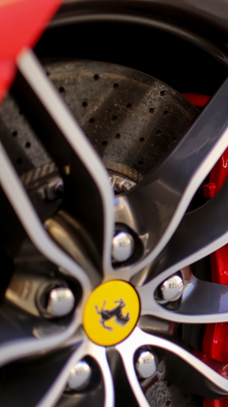 Red and Silver Car Wheel. Wallpaper in 750x1334 Resolution