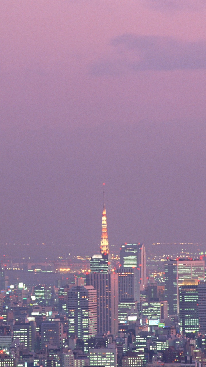 City Skyline During Night Time. Wallpaper in 720x1280 Resolution
