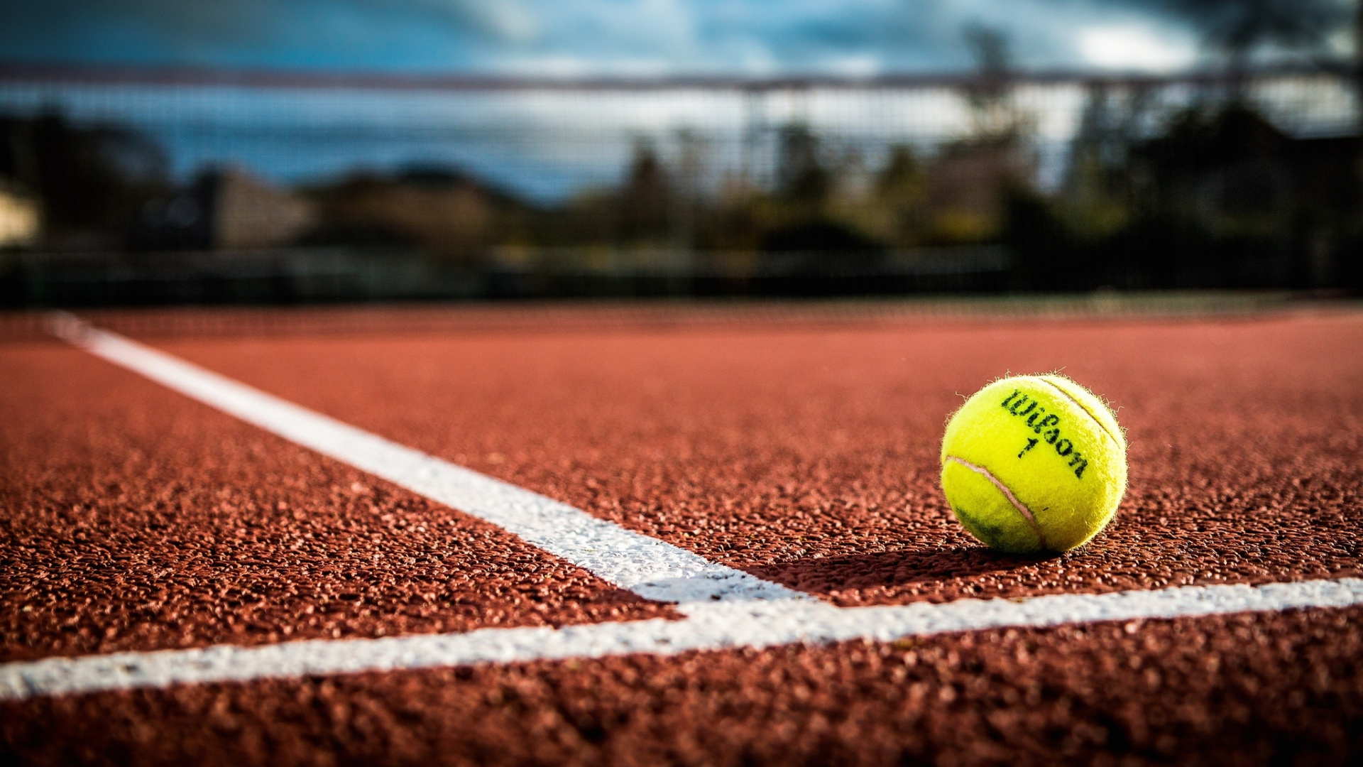 Green Tennis Ball on Ground During Daytime. Wallpaper in 1920x1080 Resolution