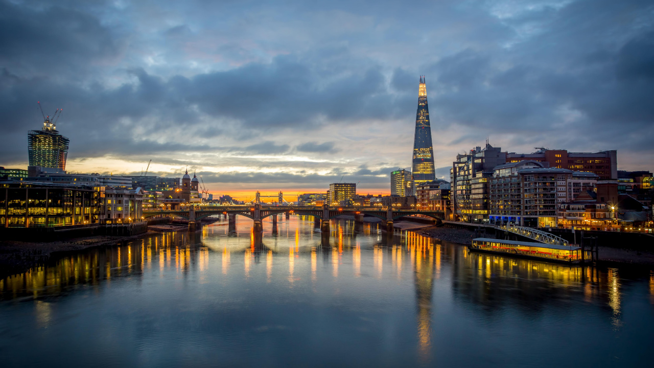 City Skyline Across Body of Water During Night Time. Wallpaper in 1280x720 Resolution