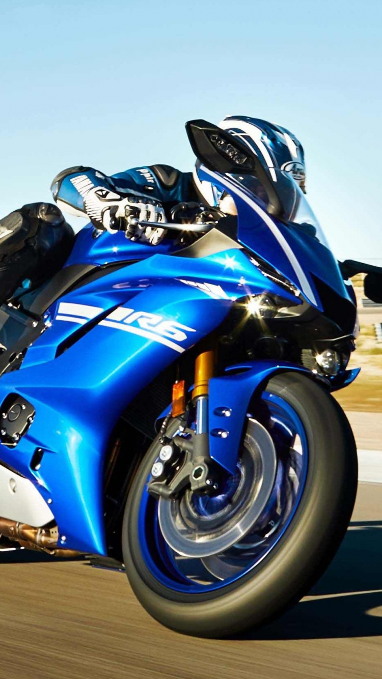Blue and Black Sports Bike on Brown Sand During Daytime. Wallpaper in 750x1334 Resolution