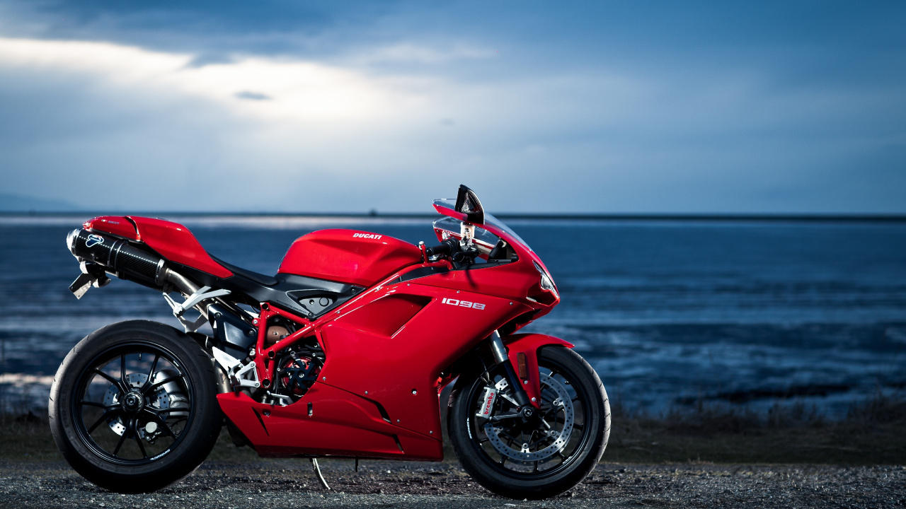 Red and Black Sports Bike on Seashore During Daytime. Wallpaper in 1280x720 Resolution