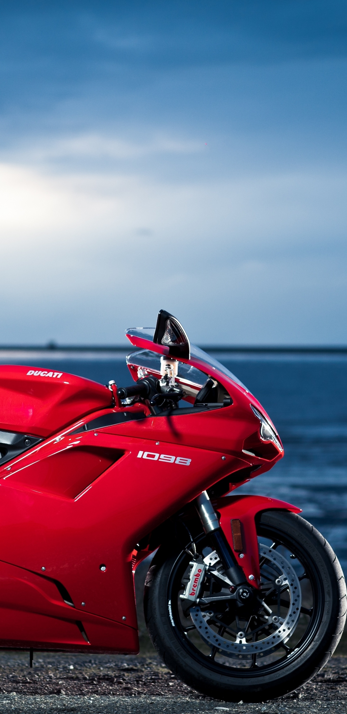 Red and Black Sports Bike on Seashore During Daytime. Wallpaper in 1440x2960 Resolution