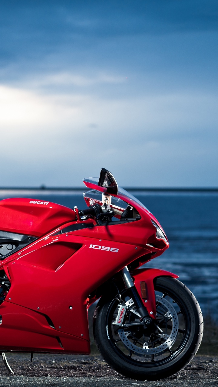 Red and Black Sports Bike on Seashore During Daytime. Wallpaper in 720x1280 Resolution
