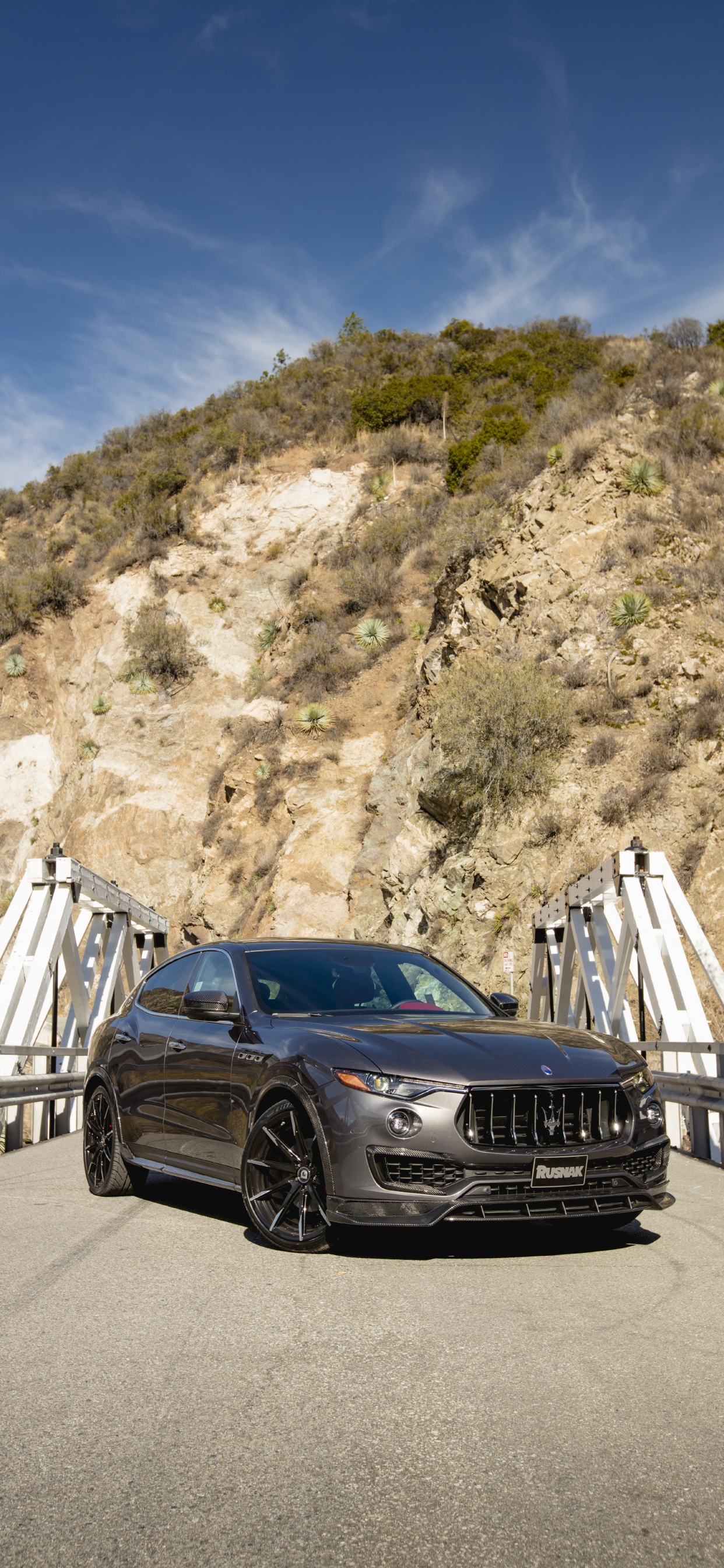 Black Bmw m 3 Coupe Parked on Wooden Bridge During Daytime. Wallpaper in 1242x2688 Resolution