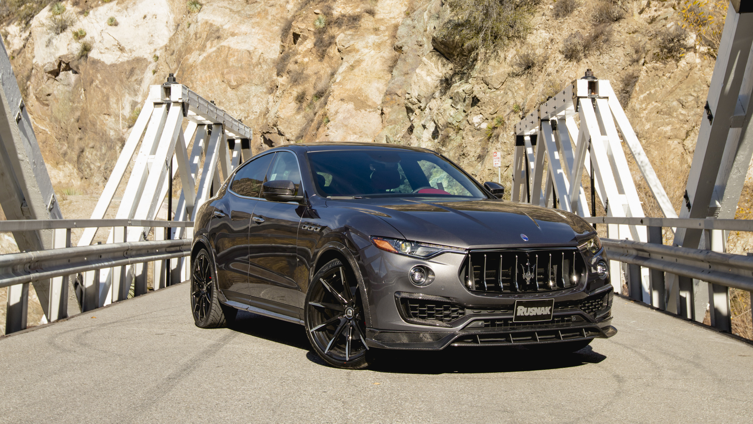 Black Bmw m 3 Coupe Parked on Wooden Bridge During Daytime. Wallpaper in 2560x1440 Resolution
