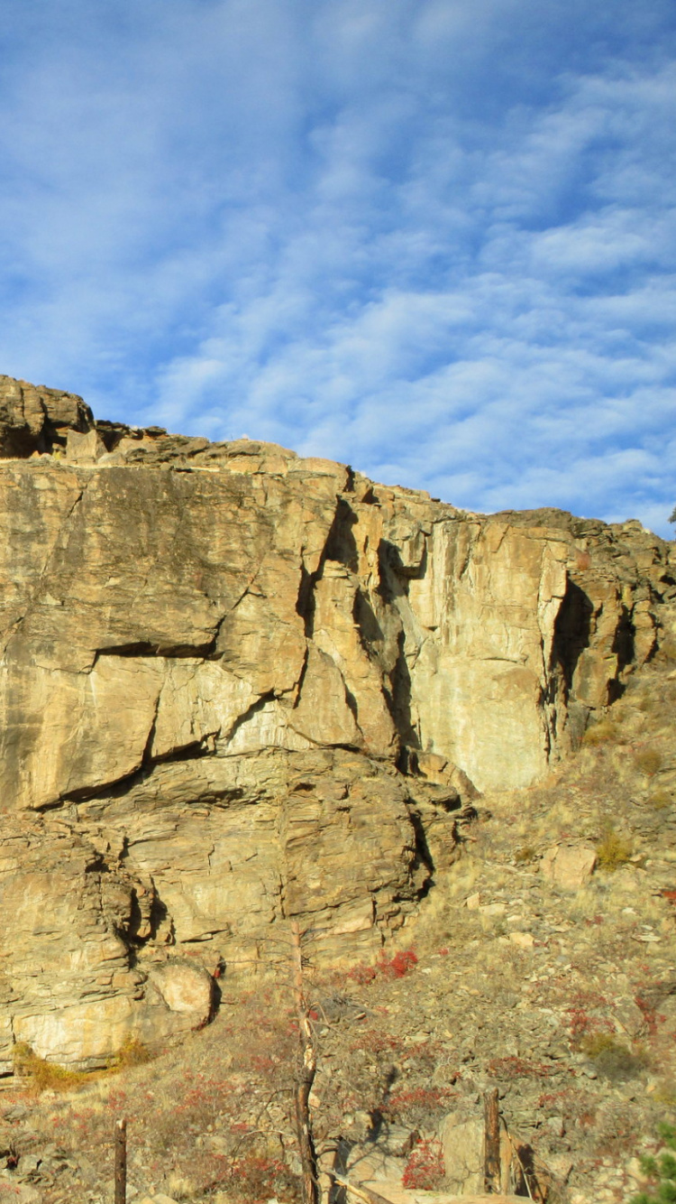Brown Rock Formation Under Blue Sky During Daytime. Wallpaper in 750x1334 Resolution