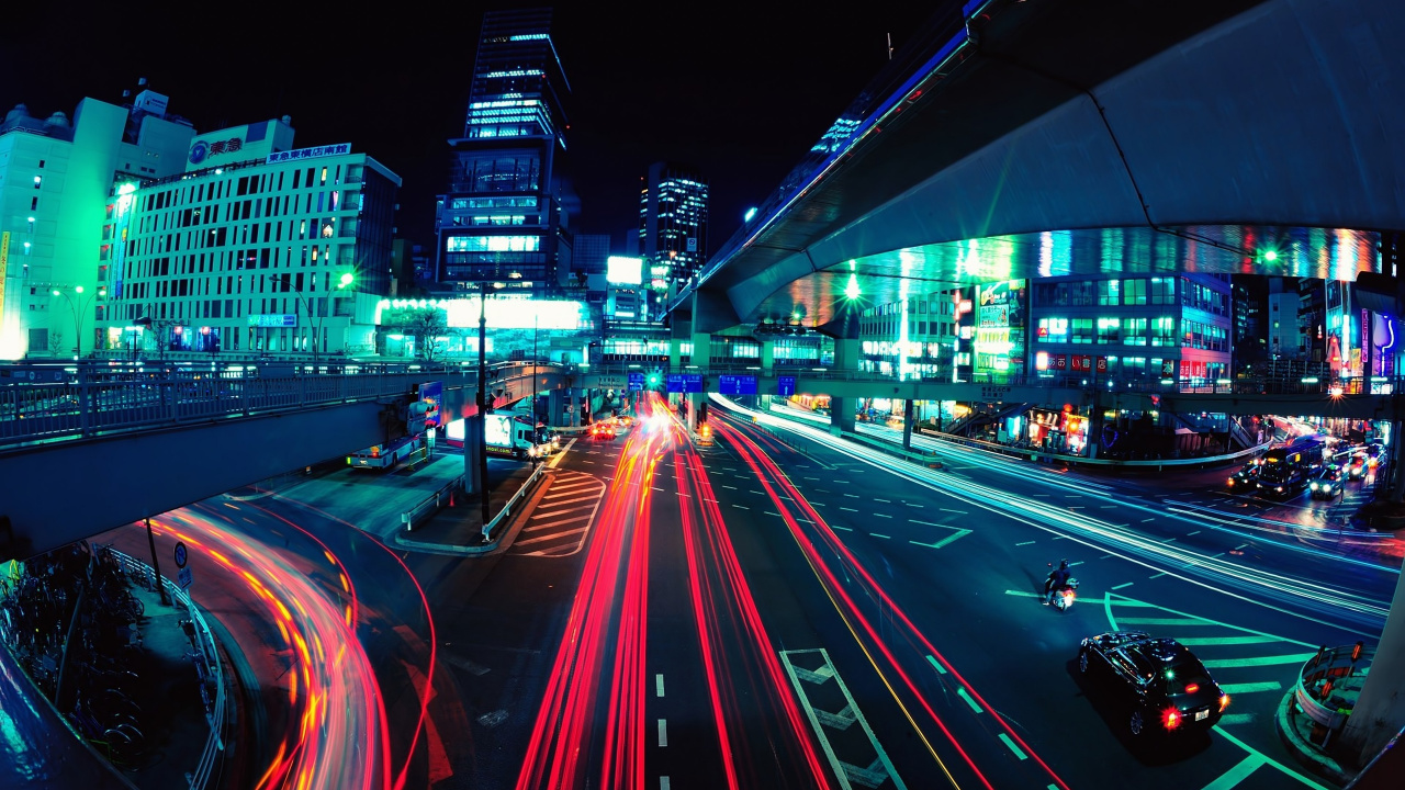 Zeitrafferaufnahmen Von Autos Auf Der Straße Während Der Nachtzeit. Wallpaper in 1280x720 Resolution