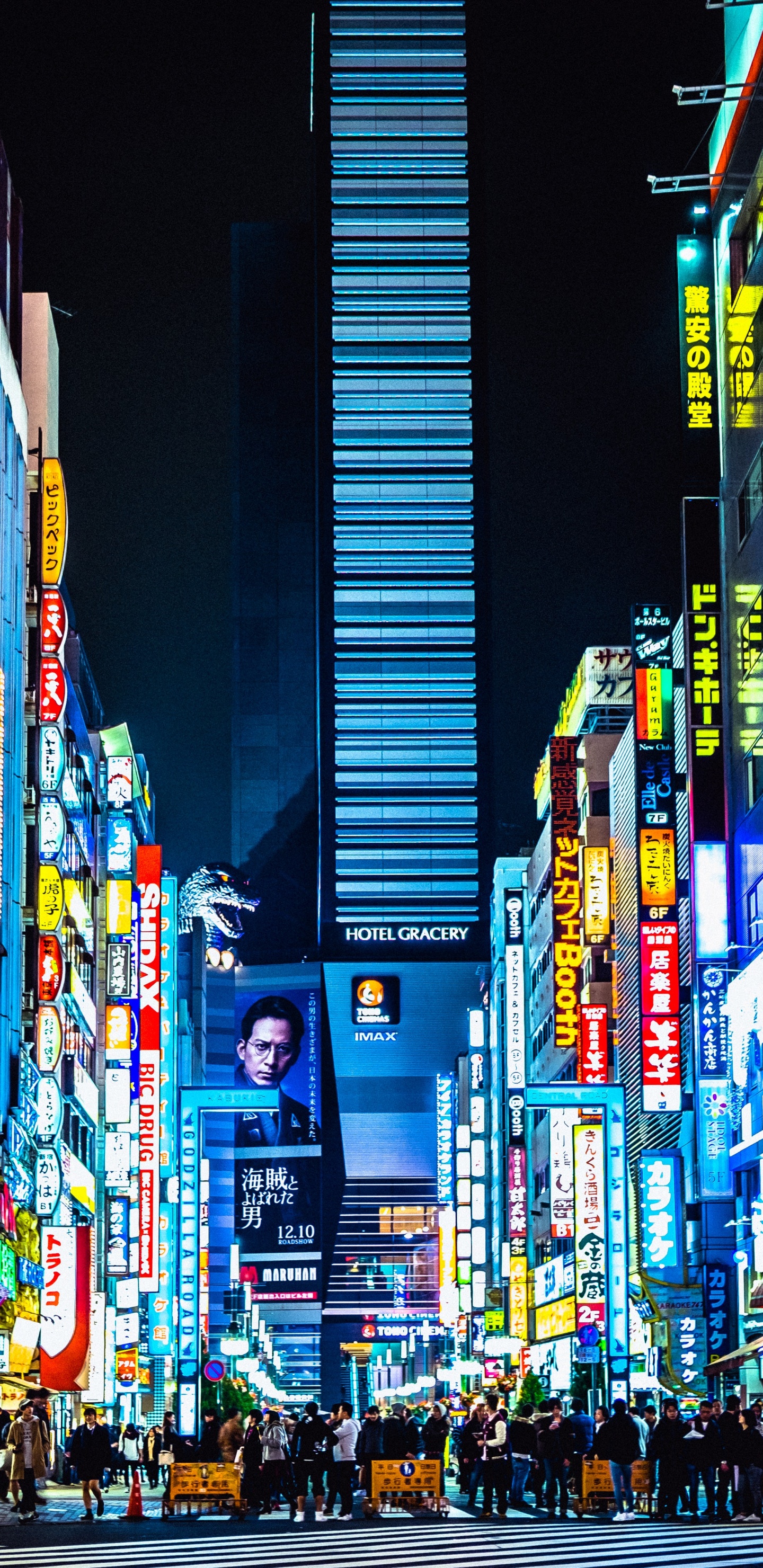 Man in Black Jacket Standing on Street During Nighttime. Wallpaper in 1440x2960 Resolution