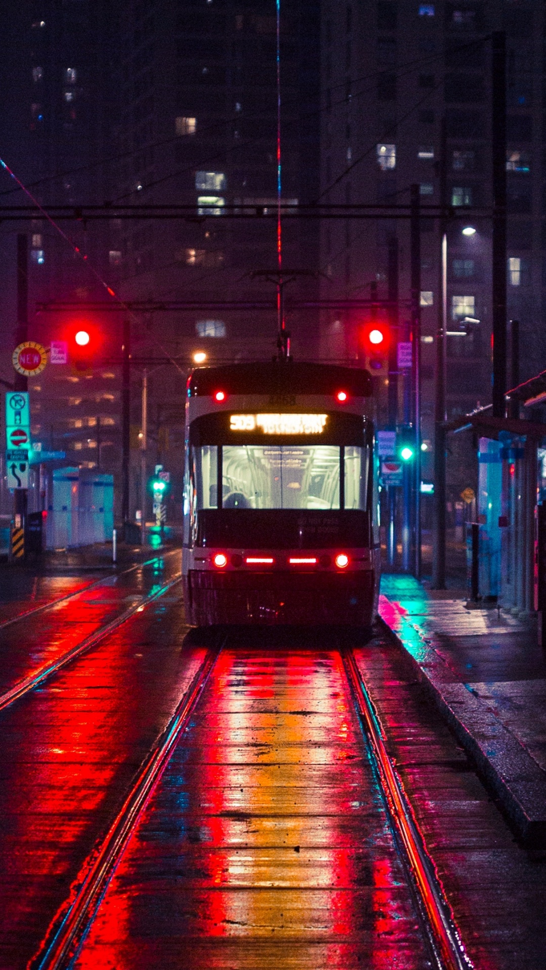 White and Brown Train on The Street During Night Time. Wallpaper in 1080x1920 Resolution