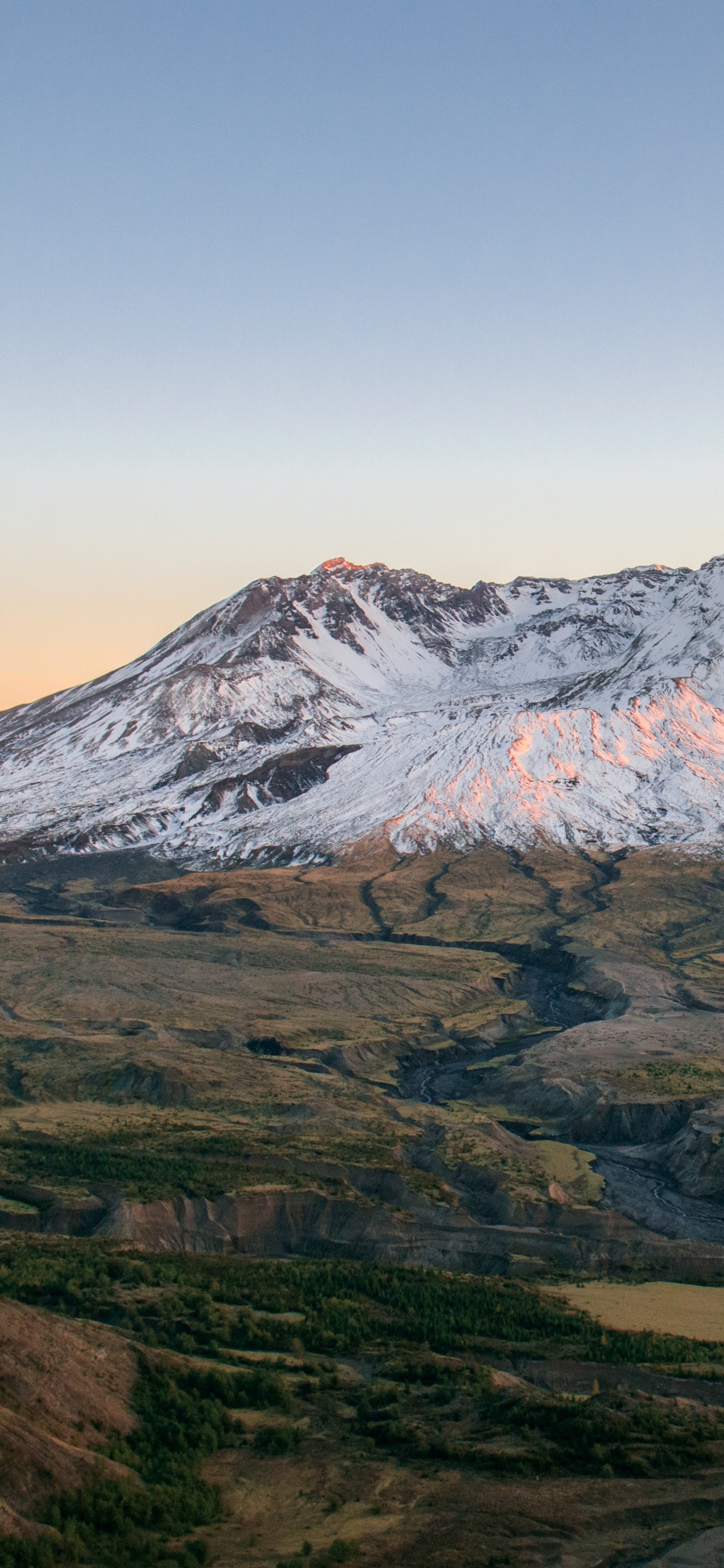Brown and White Mountain Under Blue Sky During Daytime. Wallpaper in 1242x2688 Resolution