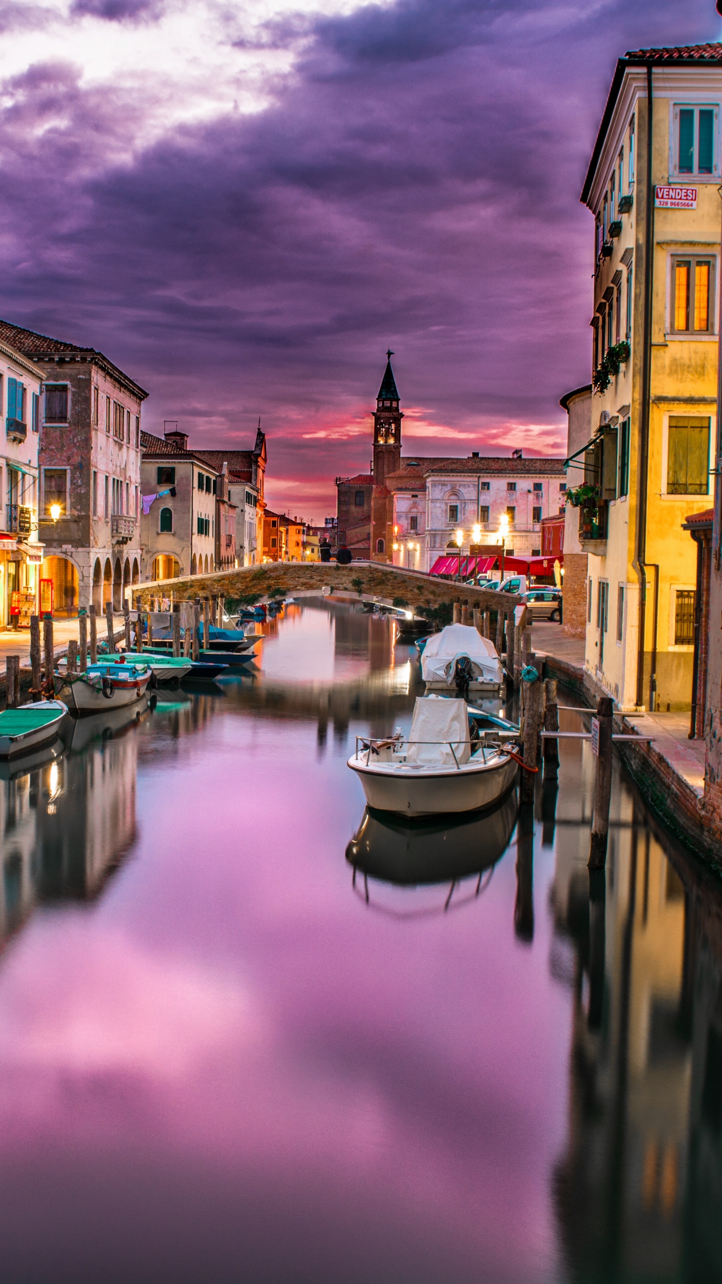 Boat on River Between Buildings During Daytime. Wallpaper in 1440x2560 Resolution