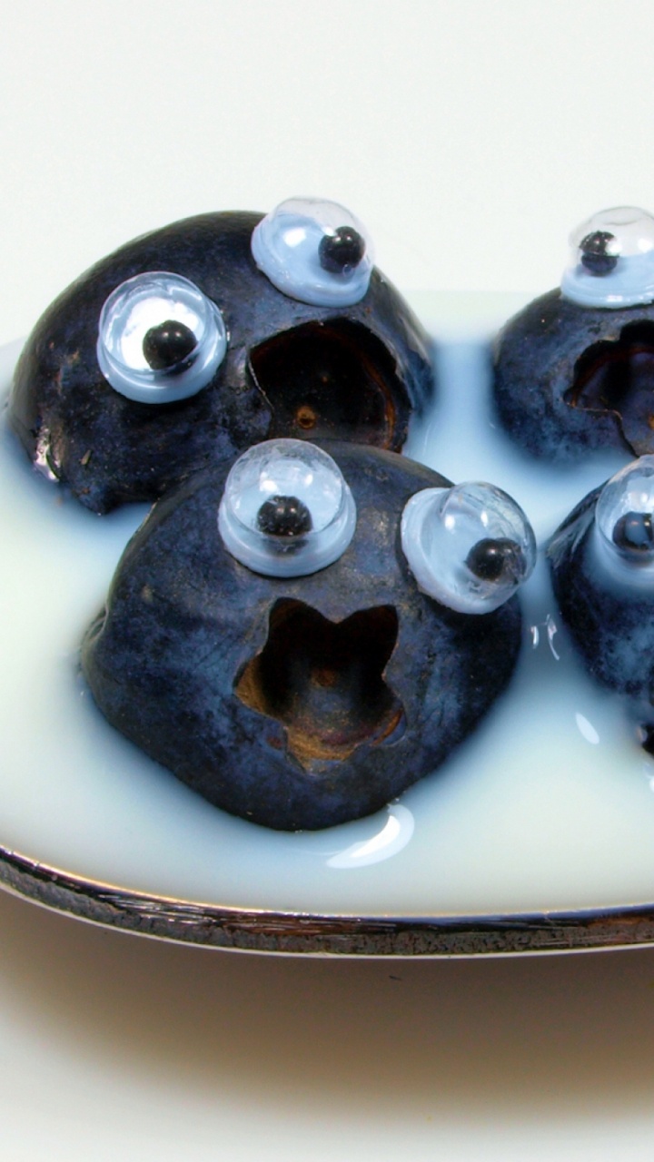 Black Round Fruits on Silver Spoon. Wallpaper in 720x1280 Resolution