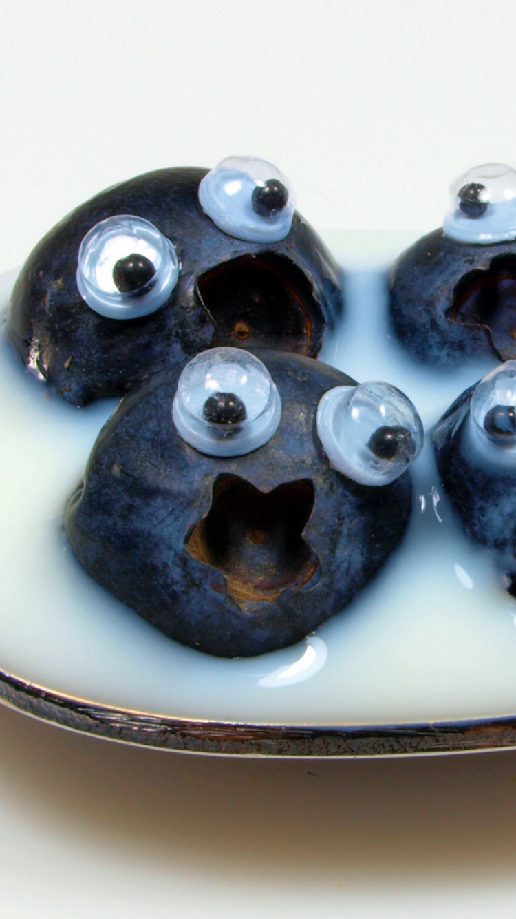 Black Round Fruits on Silver Spoon. Wallpaper in 750x1334 Resolution