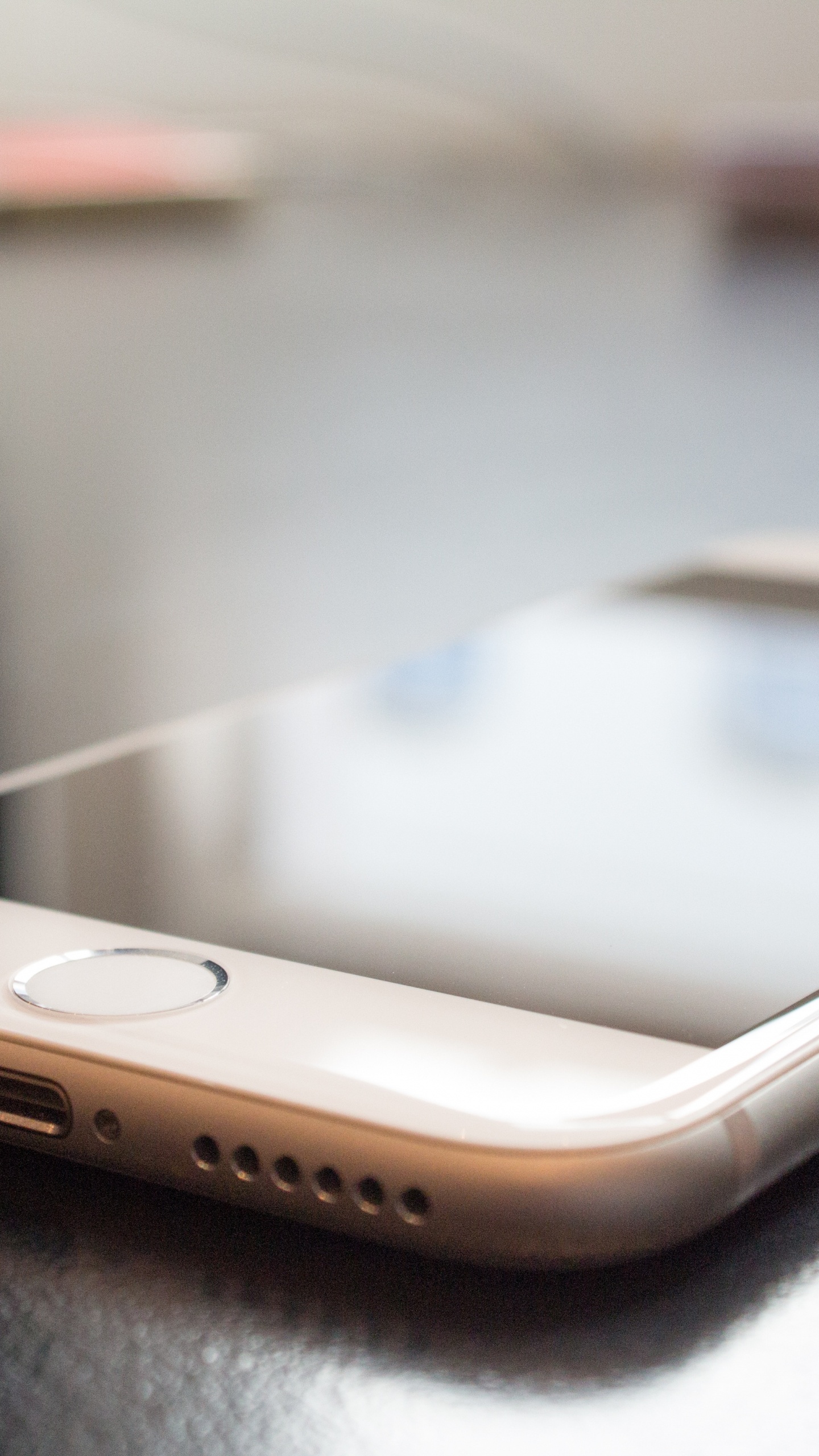 Gold Iphone 6 on Table. Wallpaper in 1440x2560 Resolution