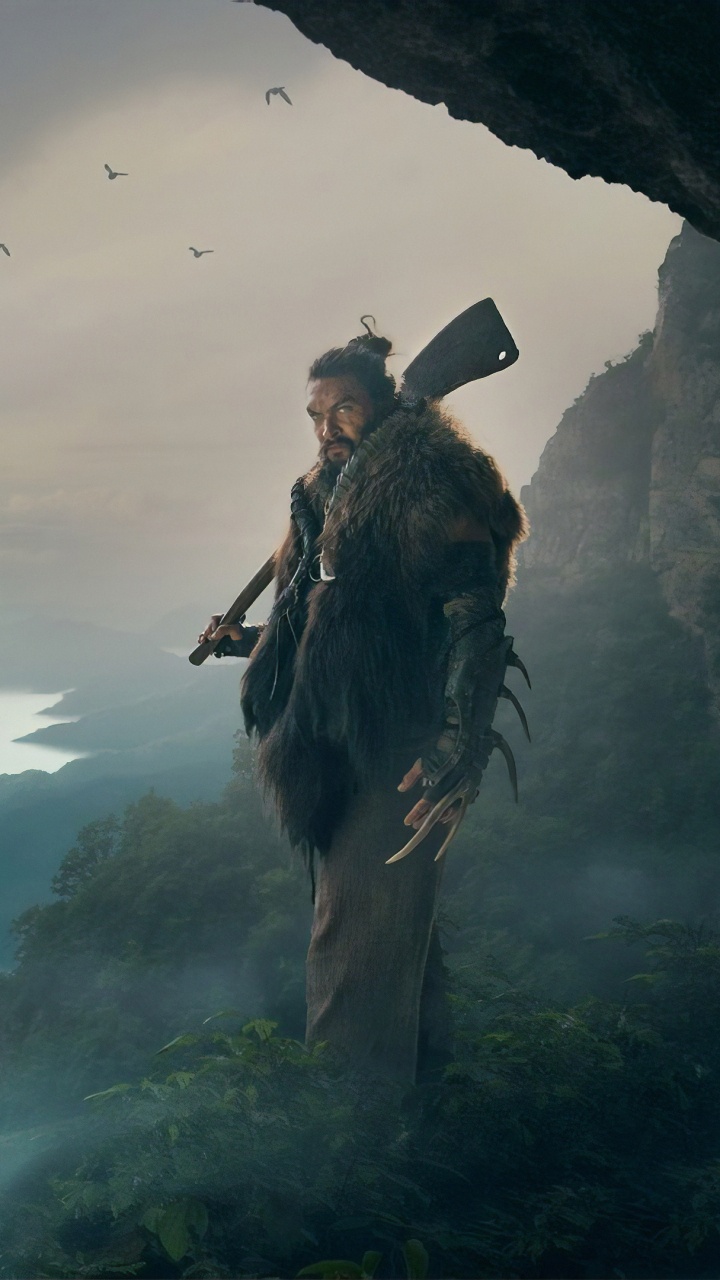 Mann in Schwarzer Jacke, Der Tagsüber Auf Einer Klippe Steht. Wallpaper in 720x1280 Resolution