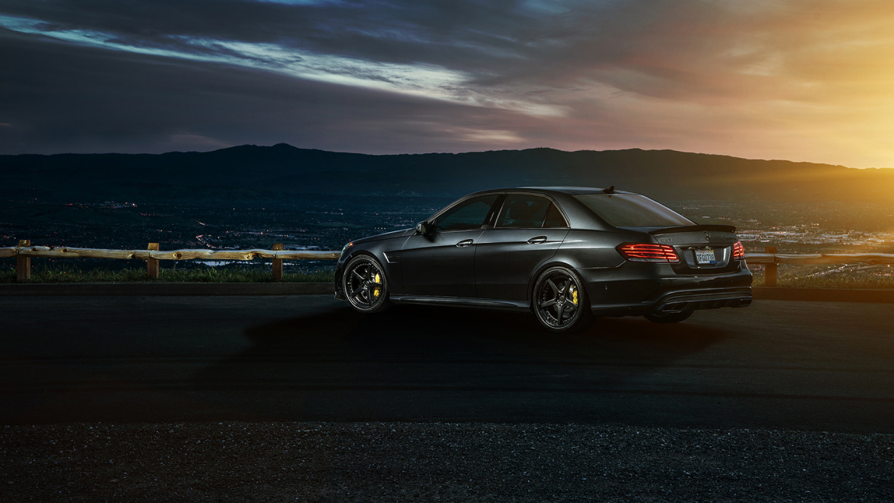 Black Sedan on Gray Asphalt Road During Daytime. Wallpaper in 1280x720 Resolution