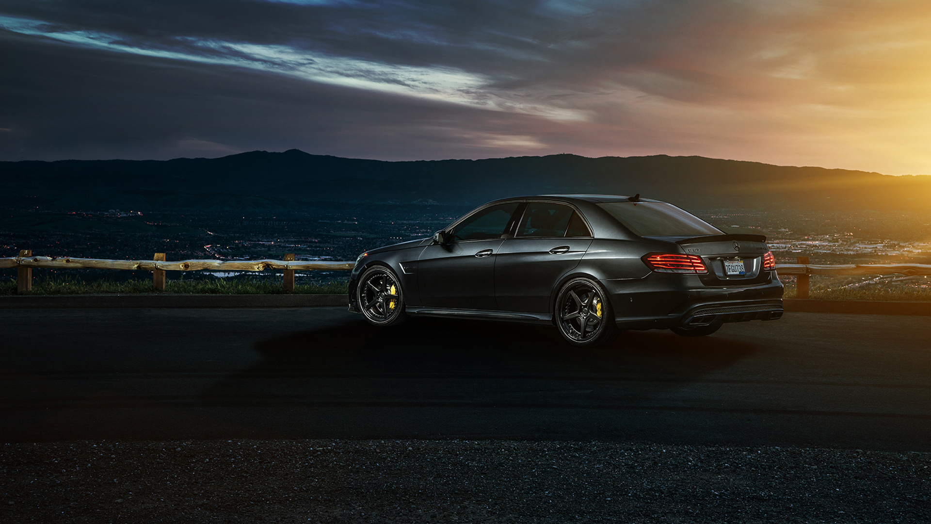Black Sedan on Gray Asphalt Road During Daytime. Wallpaper in 1920x1080 Resolution