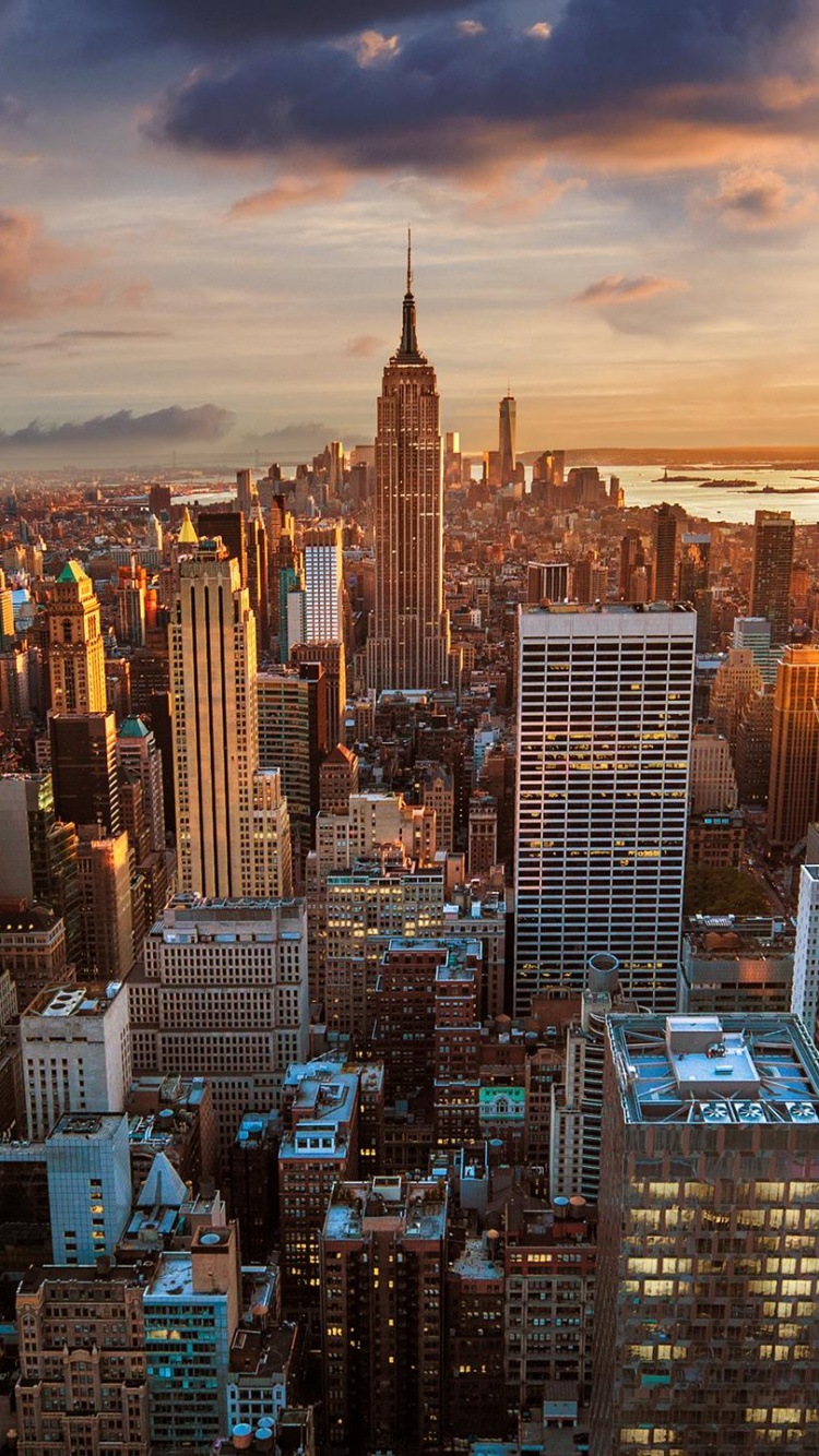 Aerial View of City Buildings During Sunset. Wallpaper in 750x1334 Resolution
