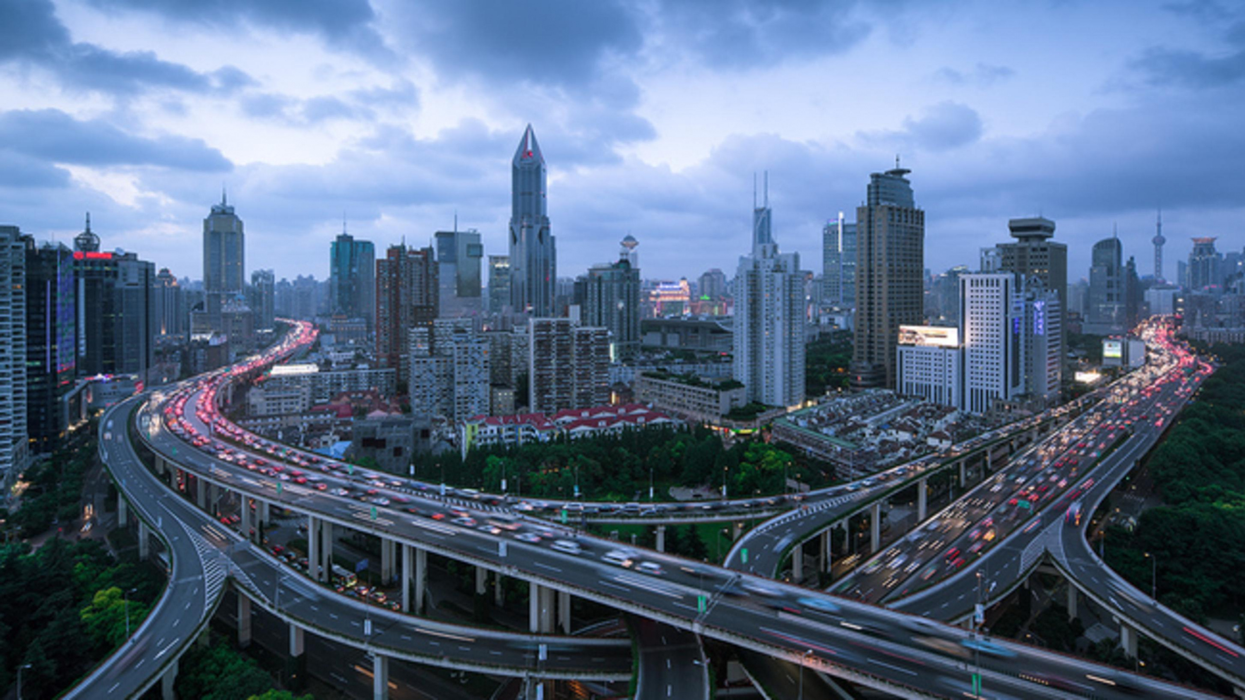 City Skyline Under Cloudy Sky During Daytime. Wallpaper in 2560x1440 Resolution