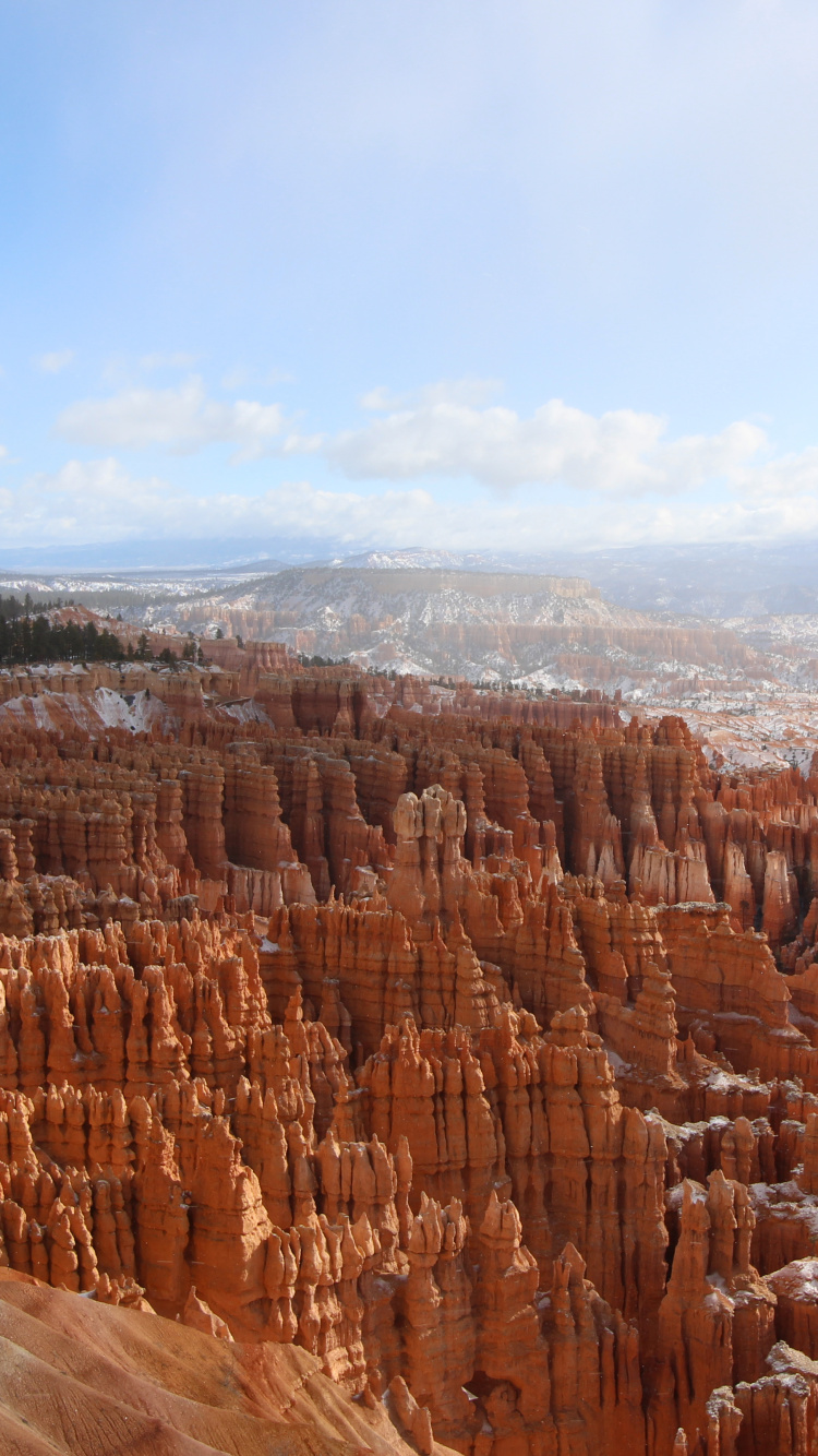 Brown Rock Formation Under White Clouds During Daytime. Wallpaper in 750x1334 Resolution