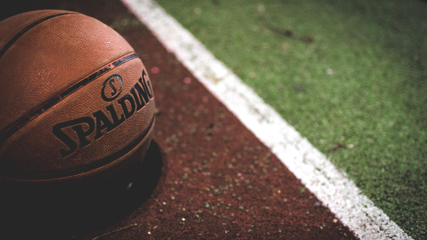 Brown and Black Basketball on Brown and White Concrete Floor. Wallpaper in 1366x768 Resolution