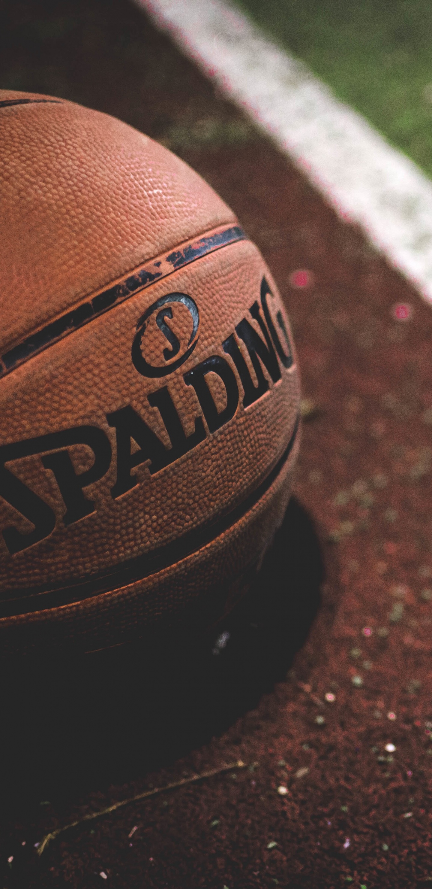Brown and Black Basketball on Brown and White Concrete Floor. Wallpaper in 1440x2960 Resolution