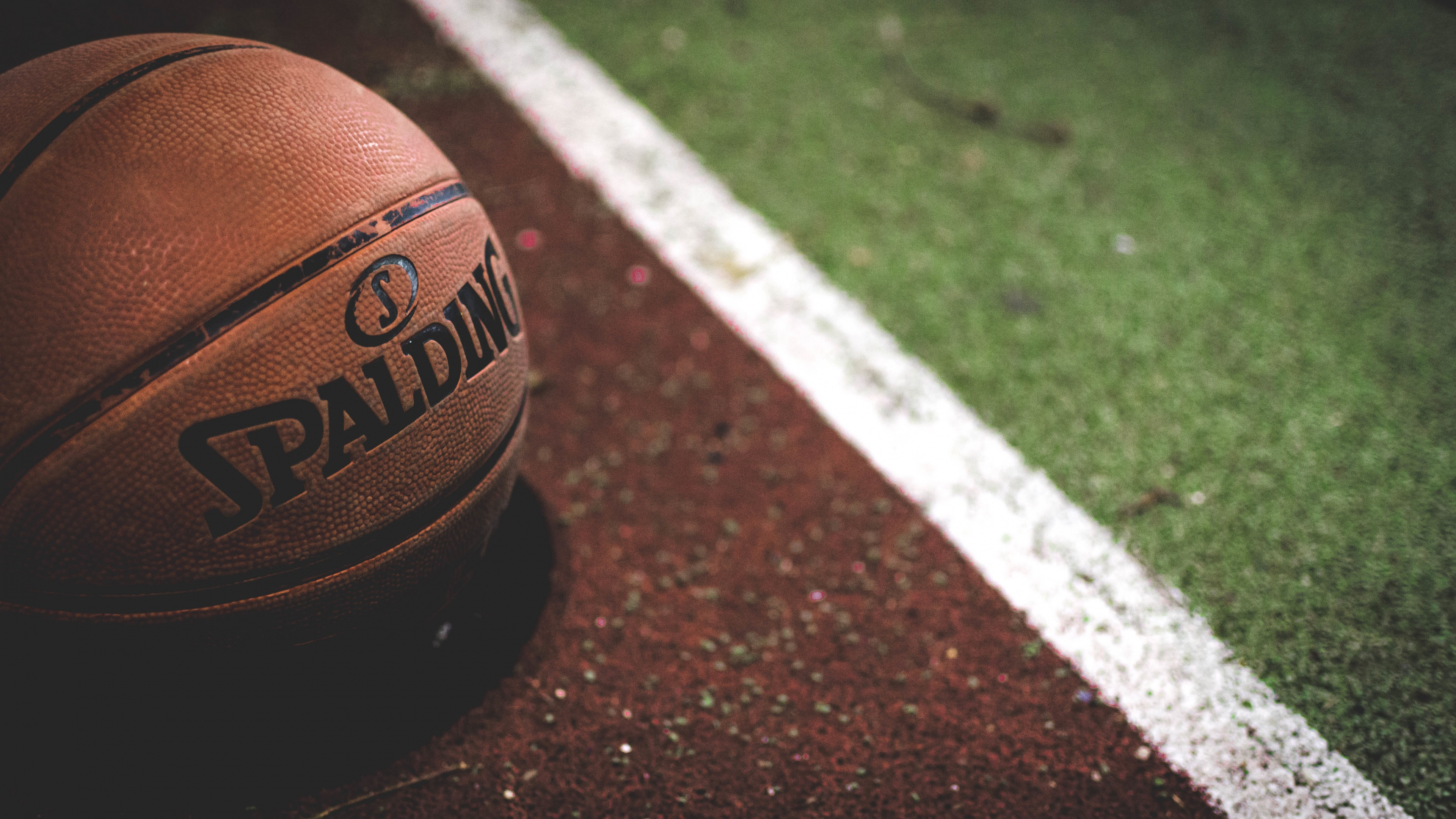 Brown and Black Basketball on Brown and White Concrete Floor. Wallpaper in 3840x2160 Resolution