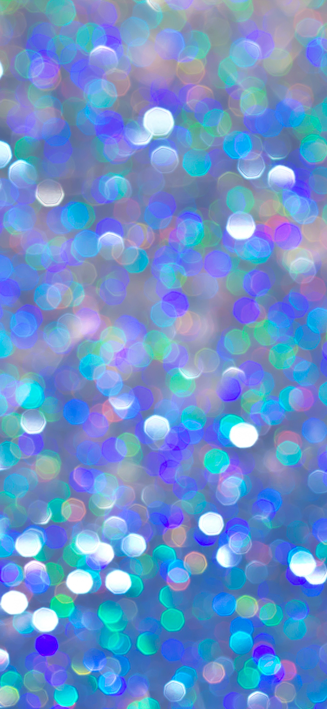 Rosa Gelbe Und Blaue Herzförmige Bonbons. Wallpaper in 1125x2436 Resolution