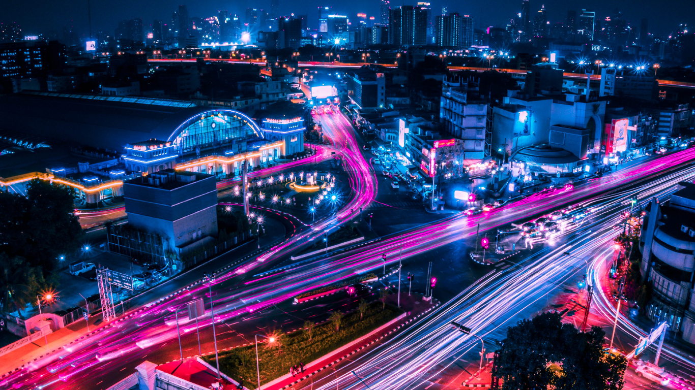 Zeitrafferfotografie Der Stadt Während Der Nachtzeit. Wallpaper in 1366x768 Resolution