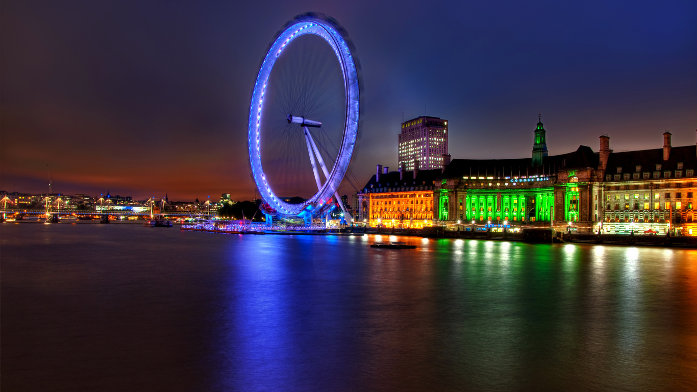 Ferris Wheel Near City Buildings During Night Time. Wallpaper in 1366x768 Resolution