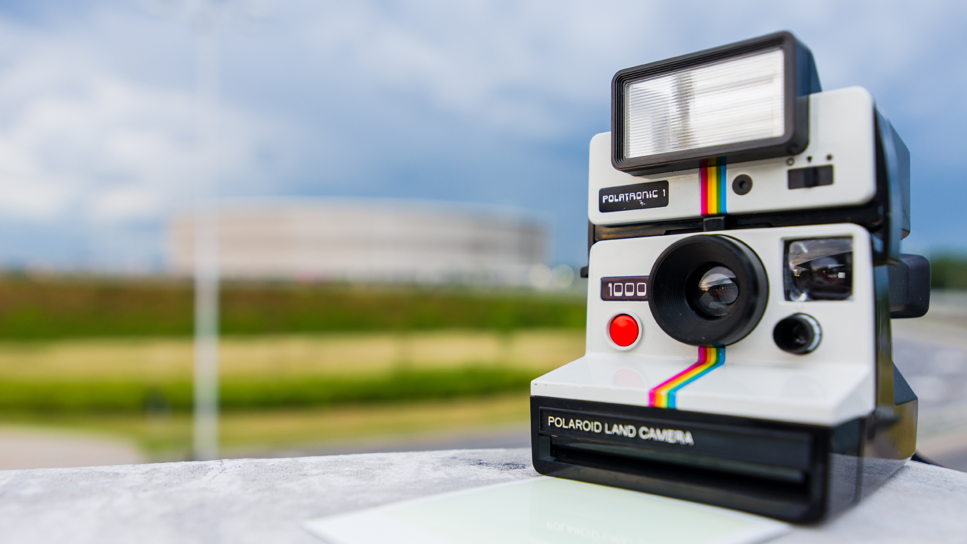 Black and White Polaroid Camera on White Table. Wallpaper in 1920x1080 Resolution