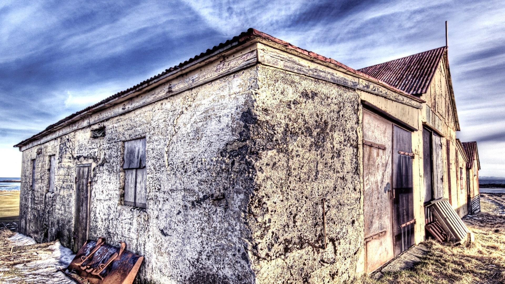 Edificio de Hormigón Marrón Bajo un Cielo Azul Durante el Día. Wallpaper in 1920x1080 Resolution