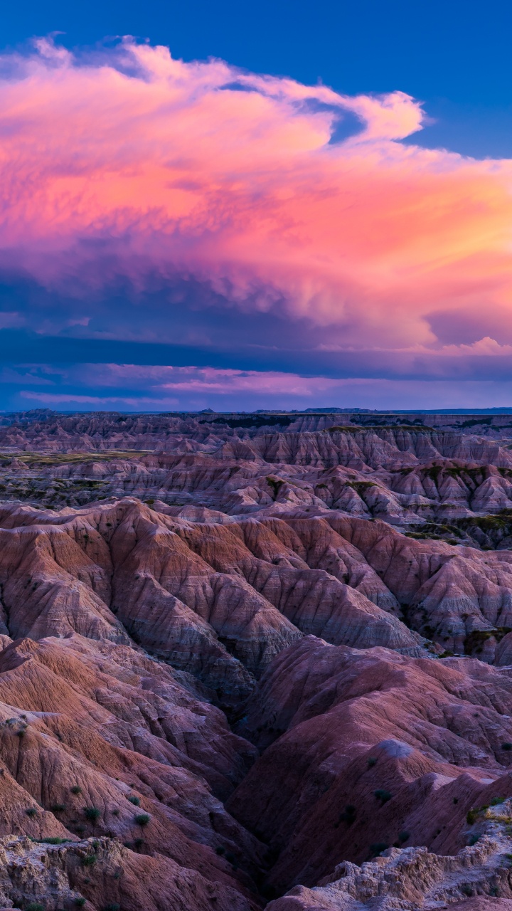 Brown Rocky Mountain Under Blue Sky. Wallpaper in 720x1280 Resolution