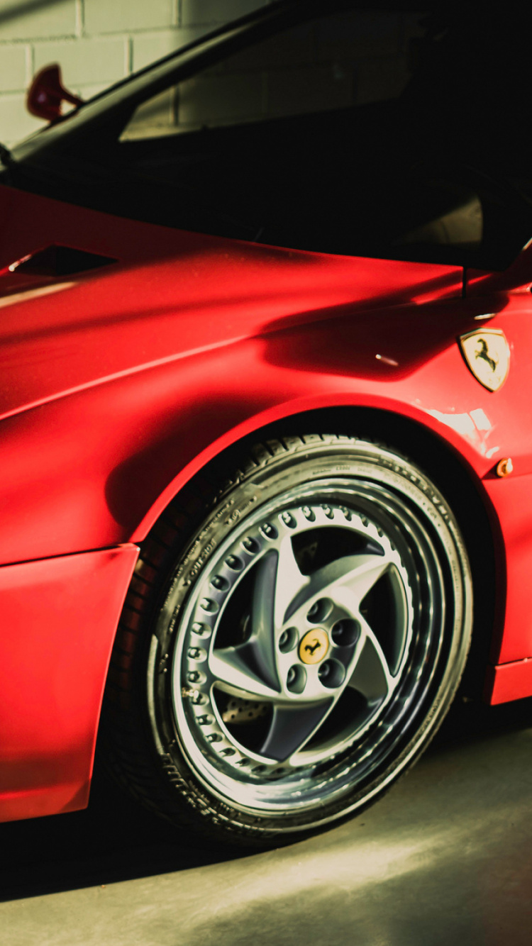 Ferrari Rouge 458 Italia Garée Devant un Mur Blanc. Wallpaper in 750x1334 Resolution