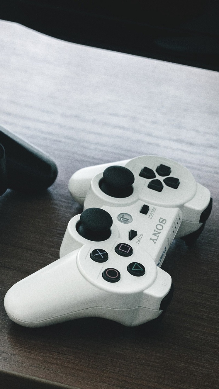 White Sony ps 4 Game Controller. Wallpaper in 720x1280 Resolution