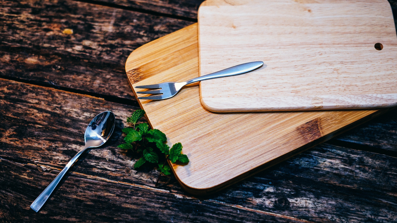 Stainless Steel Fork on Brown Wooden Chopping Board. Wallpaper in 1280x720 Resolution