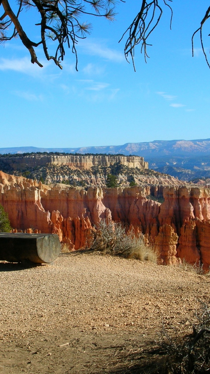 Brown Rocky Mountain Under Blue Sky During Daytime. Wallpaper in 720x1280 Resolution