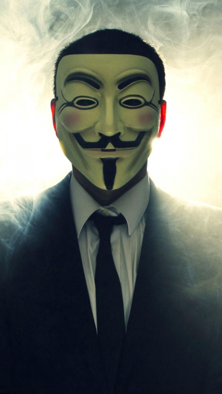 Homme en Veste de Costume Noir Portant Des Lunettes de Soleil Noires. Wallpaper in 720x1280 Resolution