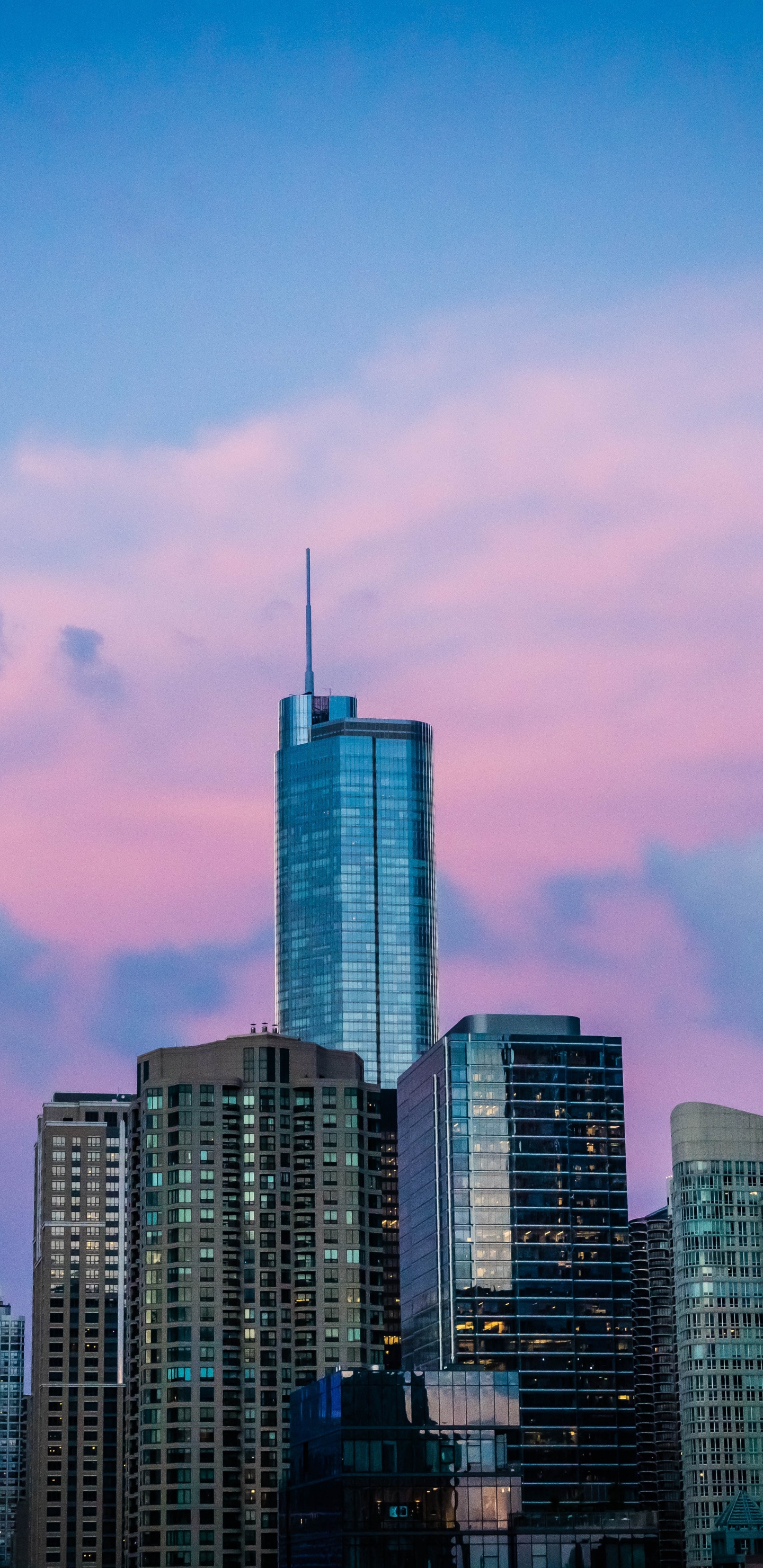 High Rise Buildings Under Blue Sky During Daytime. Wallpaper in 1440x2960 Resolution