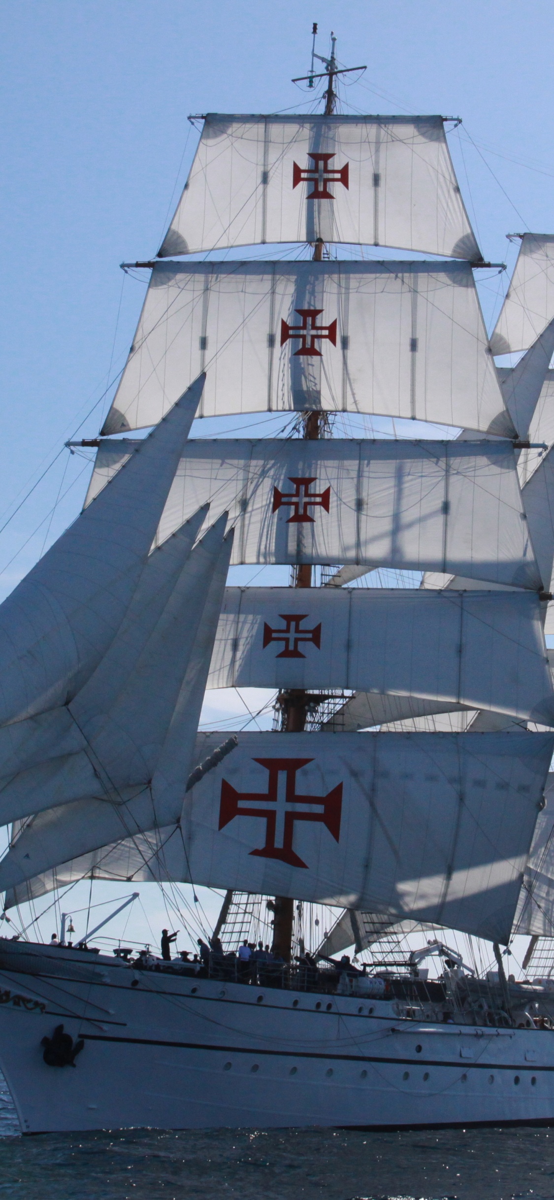 White Sail Boat on Sea During Daytime. Wallpaper in 1125x2436 Resolution